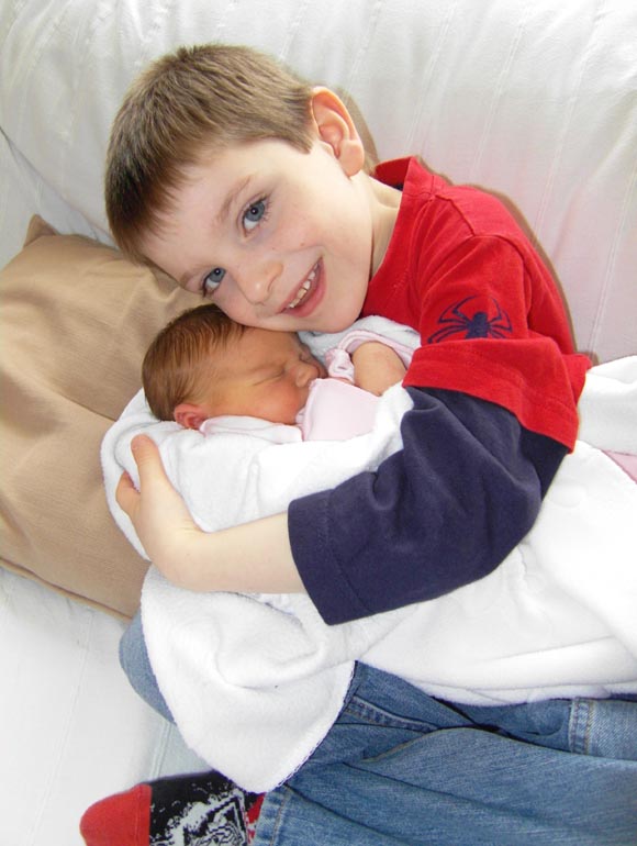 [Emma gets a cuddle from Thomas]