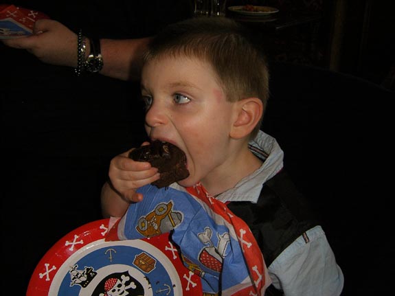 [Cramming in as much cake as possible!]