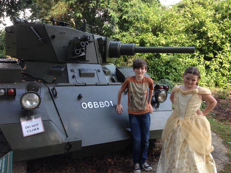 [Tom and Emma and a tank]