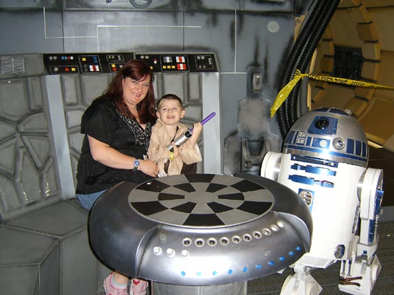 [Marnie and Tom meet R2-D2]