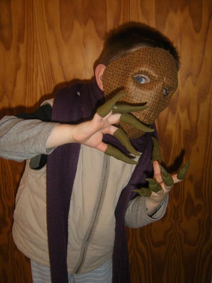 [Dressing up as a creepy scarecrow]