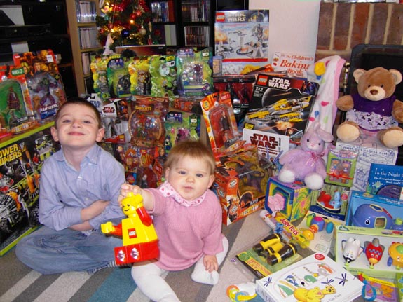 [Xmas 2009 - Tom and Emma with all their presents!]